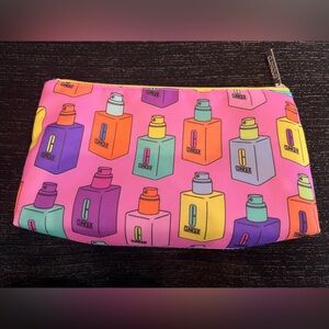 Vibrant and beautiful multi-color Clinique makeup bag